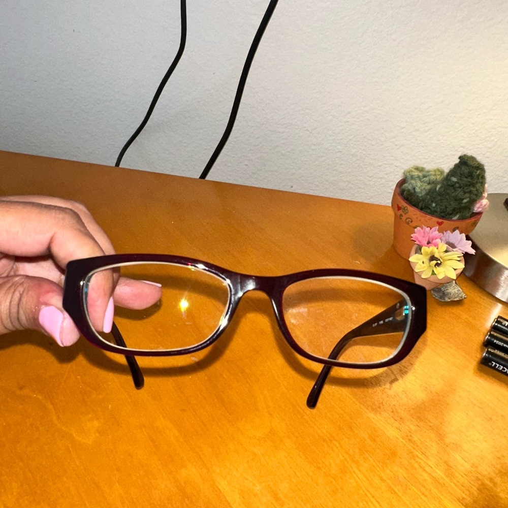 Guess glasses.  Magenta with some light blue on the inside.